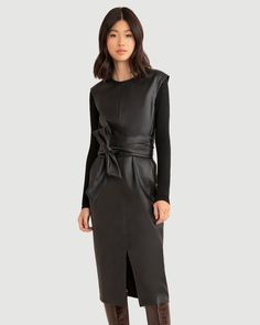 A sleek and modernized take on the LBD — this vegan leather dress is perfect for the office layered over a long-sleeve tee or on its own for date night. See below for our general Size Guide and available measurements Made of polyester, lining made of polyester Machine wash cold separately, tumble dry at low temperature, cool iron as needed Dress Modern, Tie Front Dress, Faux Leather Dress, Black Xs, Leather Dress, The Office, Date Night, Vegan Leather, High Neck Dress