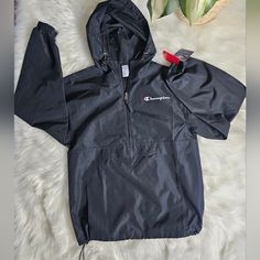 New With Tag. Size Small. Huge Front Zippered Pocket. 100% Polyester. Black Half-zip Windbreaker For Outdoor Activities, Black Nylon Half-zip Windbreaker, Black Half-zip Hiking Outerwear, Black Half-zip Outerwear For Hiking, Black Half-zip Windbreaker For Winter, Black Half-zip Winter Windbreaker, Black Urban Half-zip Windbreaker, Black Half-zip Urban Windbreaker, Black Hiking Windbreaker With Drawstring Hood