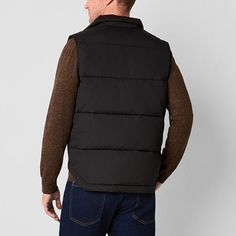 Layer up in style for cold-weather outings with this St. John's Bay men's quilted cargo puffer vest. Made from a warm material and lining, this midweight style has two front snap pockets and a full zip closure. Wear it over a sweater with jeans.Closure Type: ZipperPockets: 2 Front Snap PocketsWarmth Factor: MidweightApparel Length: 27 InchesOuterwear Length: ShortFiber Content: 100% PolyesterFabric Description: WovenFilling Content: 100% PolyesterLining: LinedLining Material: PolyesterCare: Mac… Winter Utility Nylon Vest, Black Utility Vest For Winter, Black Vest For Outdoor Work In Winter, Cotton Vest Outerwear For Cold Weather, Black Winter Vest For Outdoor Work, Sleeveless Black Outerwear For Outdoor Work, Utility Vest For Winter Outdoor Activities, Winter Utility Vest For Outdoor Activities, Black Quilted Vest For Winter