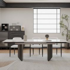 a modern dining room with white chairs and a table