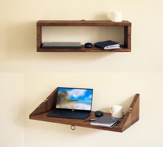 two wooden shelves with laptops and books on them, one holding a coffee mug