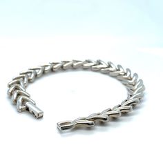 *Estate piece Sterling silver bracelet, solid links in a chevron style. 21.9g Silver Bracelets With Rectangular Links For Anniversary, Formal Flexible Silver Bracelets, Classic Silver Tennis Bracelet With Rectangular Links, Formal Silver Oval Link Tennis Bracelet, Silver Flexible Chain Bracelet For Formal Occasions, Chevron Design, Sterling Silver Bracelet, Chain Link Bracelet, Sterling Silber