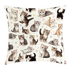 a white pillow with cats on it and paws all over the front, in different colors