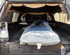 there is a bed in the back of a truck