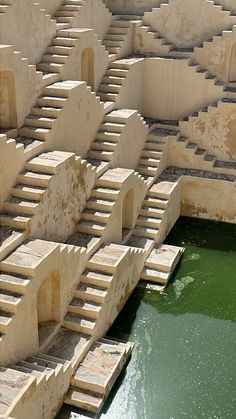 the water is green in color and it looks like they are made out of stone