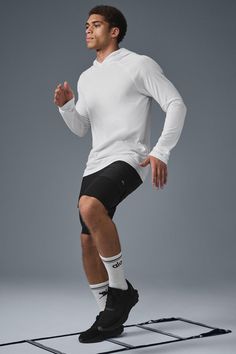 So soft — but still equipped to handle heavy-duty workouts. The tech-equipped Core Hooded Runner is made of sueded, tri-blend jersey that wears well all day. Raglan sleeves make this a perfect solo or layered player. Perfect layered or solo Raglan sleeves — work out then wear out Designed & uniquely fit for every size Wear-tested by our in-house team for the perfect fit Alo Yoga Sporty Top With Drawstring Hood, Sporty Outdoor Hoodie With Ribbed Cuffs, Sporty Hoodie With Ribbed Cuffs For Outdoor, Alo Yoga Sportswear For Running, Alo Yoga Athleisure Activewear For Running, Alo Yoga Running Activewear, Alo Yoga Moisture-wicking Sportswear, Urban Hooded Activewear For Sports, Techwear Sports Hooded Top