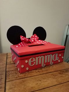 a red box with minnie mouse ears on it