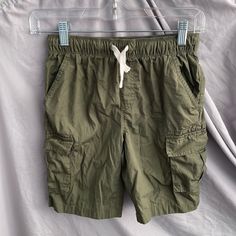 Boy's Shorts Brand Dip Size Medium (8-10) Color Army Green Adjustable Waist Four Pockets Lightweight, Perfect For Summer Brand New Without Tags Never Been Worn Comes From A Smoke Free And Pet Free Home Casual Summer Shorts For School, Casual Summer School Shorts, Green Cotton Shorts For School, Green Cotton School Shorts, Summer School Bottoms With Pockets, Short Playwear Shorts With Pockets, Green Shorts With Pockets For Playwear, Spring Playwear Shorts With Pockets, Short Shorts With Pockets For Playwear