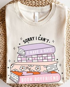 a t - shirt that says sorry i can't, i have a date with books on it