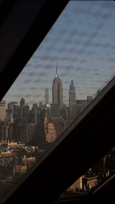 a view of the empire building from an observation platform in new york city, ny