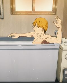 a man sitting in a bathtub with his hand up to the side and one arm out