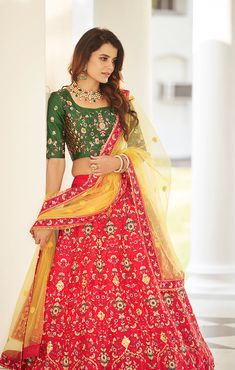 This Lehenga Choli is Ready to Wear A stunning lehenga with beautiful Thread with Sequence Embroidered blouse, dupatta and lehenga, designed specially for wedding season Blouse & Lehenga Fabric - Silk Inner Fabric - Santoon Dupatta Fabric - Net Color - Red/Green Style - Partywear, Engagement, Sangeet Lehenga Embroidery - Thread with Sequence Embroidered Choli Length - 16 Inches Lehenga Length - 44 Inches Dupatta Length - 2.30 Mtrs NOTE: Originally stitched in size 34 & 42 but can be altered for Red Dola Silk Gown For Festivals, Red Dola Silk Lehenga For Traditional Ceremonies, Red Embroidered Dola Silk Gown, Embroidered Red Dola Silk Gown, Red Art Silk Lehenga For Wedding, Red Art Silk Floor-length Lehenga, Red Meenakari Sets For Traditional Ceremonies, Red Sets With Meenakari For Diwali, Red Meenakari Sharara In Dola Silk