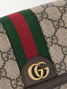 First introduced in 2018, Gucci's 'Ophidia' bag quickly became a fashion staple. This style is crafted from coated-canvas detailed with the label’s signature 'GG' monogram and trimmed with leather and striped webbing. It has an internal zipped pocket for smaller items and an adjustable shoulder strap, should you want to carry it cross-body. Messenger Bag For Men, Gucci Collection, Gucci Ophidia, Gg Monogram, Canvas Messenger Bag, Messenger Bag Men, Gucci Accessories, Fine Jewelry Designers, Luxury Gifts