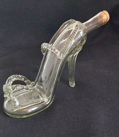 Unique Vintage glass lamp work bottle in the shape of a high heel platform shoe. Very unusual and a work of Art that is a great display and conversation piece. May look different with a coloured liquid within it. Something for a wedding, or for Someone who loves shoes or fashion and is celebrating. In amazingly perfect condition. Height 6 inches Width  10 inches Vintage Glass Lamp, Glass Dolls, Glass Shoes, Platform Shoe, Platform High Heel Shoes, High Heel Platform, Glass Lamp, Vintage Shoes, Platform Shoes