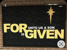 a sign on the wall that says for us a son is given with a star