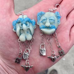 🎄 Relive the hilarity and charm of "The Muppet Christmas Carol" with these whimsical Statler and Waldorf as Marley and Marley earrings, lovingly crafted from durable and lifelike Cosclay! 🎄 🎭 These earrings pay homage to the comical duo's unforgettable portrayal of Jacob and Robert Marley, bringing a touch of Muppet magic to your holiday season. Product Details: 🪄 Detailed Design: Each earring showcases the iconic Marley and Marley look, featuring their ghostly chains and varying locks for added authenticity. 🌟 Handcrafted Quality: Made from premium Cosclay, these earrings ensure both durability and stunning features.  Materials: Premium Cosclay for exceptional detail Hypoallergenic earring hooks for sensitive ears These Statler and Waldorf as Marley and Marley earrings are more than Quirky Blue Jewelry For Gifts, Quirky Blue Jewelry For Gift, Quirky Dangle Jewelry Gift, Quirky Dangle Jewelry As A Gift, Quirky Dangle Jewelry For Gifts, Labyrinth Door Knockers, The Muppet Christmas Carol, Muppets Christmas, Muppet Christmas