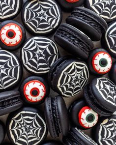 black and white decorated cookies with red eyes