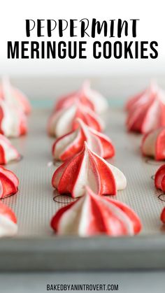 red and white peppermint meringue cookies on a baking sheet with text overlay