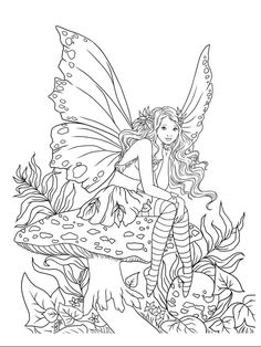 a fairy sitting on top of a mushroom