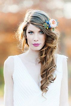 a woman with long hair and flowers in her hair is featured on an instagram page