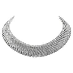 This Sophia D necklace features 35 carats of high-quality diamonds, set in 18K white gold. The design highlights a classic, timeless aesthetic with a modern touch, ensuring a sophisticated look. Metal: 18K White Gold Total Carat Weight: 35 Carats Weight: 242.60 Grams A striking balance of substantial presence and refined craftsmanship, this necklace is a statement of understated luxury. Sophia D has been known world-wide for over 40 years because of its rich history of design and quality craftsm