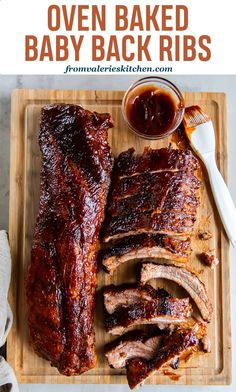 baby back ribs on a cutting board with bbq sauce in the background and text overlay