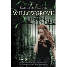 a woman standing in front of a gate with her hand on her face and the words willow grove written below