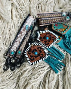 Hand tooled and painted ear tag style Tassel is genuine leather Features buck stitch accents Lobster Claw Brass hardware Wrist Keychain, Ear Tag, Lobster Claws, White Feathers, Some Text, Western Jewelry, Leather Tooling, Brass Hardware, Leather Working