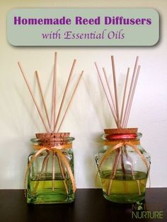 two glass jars with reed diffusers in them