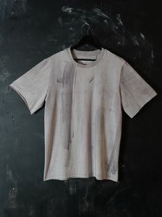 "Naturally dyed cotton t-shirt. Loose fit long minimalist t-shirt. Raw edge sleeves. Fabric is hand dyed using organic plant matter. Each piece is dyed individually and no two can ever be the same. Size L Measurements: Chest: 47\" (120 cm)  Bottom: 48\" (122 cm)  Sleeve: 11\" (28 cm)  Shoulders: 20\" (50 cm)  Length: 31\" (78 cm)  One of a kind top! #223" Distressed T-shirt, Hand Dyed Graphic Tee With Short Sleeves, Hand Dyed Short Sleeve Graphic Tee, Hand-dyed Graphic Tee With Short Sleeves, Hand Dyed Relaxed Fit Graphic Tee, Bleached Graphic Tee With Crew Neck, Relaxed Fit Hand Dyed Graphic Tee, Bleached Crew Neck Graphic Tee, Bleached Short Sleeve T-shirt For Streetwear