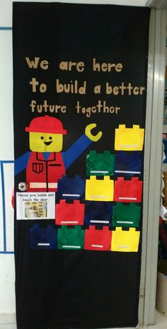 a bulletin board with legos on it that says we are here to build a better future together