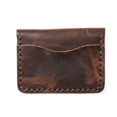 Modern aesthetics meets old-school style in this Leather Wallet.When you slip our 5 Card Wallet into your pocket, it almost feels like nothing is there. Your wallet will gather compliments from friends and earn patina the more you use it. From the intoxicating leather aroma to our attention to detail it will be hard to put this wallet down.Our full-grain leather means your wallet will develop character and patina. We hand-sew this wallet with thick Tiger Thread so it will never unravel or come a Vintage Card Holder With Interior Card Slots, Vintage Card Holder With Card Slots For Daily Use, Vintage Card Holder For Daily Use, Vintage Card Holder With Rfid Blocking For Daily Use, Vintage Brown Card Holder For Everyday Use, Vintage Rectangular Card Holder For Everyday Use, Everyday Vintage Wallet With Rfid Blocking, Vintage Bifold Card Holder With Interior Slots, Classic Rectangular Wallet With Waxed Finish