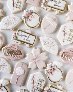 decorated cookies are displayed on a white surface