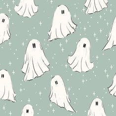 a group of ghost like objects on a green background with white stars in the sky