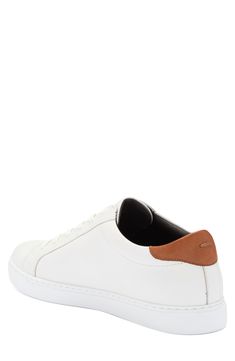 A contrast-color heel and welt bring sleek definition to the contours of this leather sneaker featuring a debossed logo on the heel. Leather upper and lining/rubber sole Imported Leather Slip-on Sneakers With Contrasting Heel, Casual Custom Sneakers With Contrasting Heel Counter, Modern Leather Sneakers With Contrasting Heel Counter, Casual Leather Sneakers With Contrasting Heel Counter, Casual Leather Sneakers With Contrasting Heel, Leather Custom Slip-on Sneakers With Gum Sole, Leather Slip-on Custom Sneakers With Gum Sole, Custom Leather Slip-on Sneakers With Gum Sole, Sporty Custom Leather Sneakers With Contrasting Heel