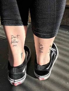 two people with matching tattoos on their feet, one is saying don't follow me