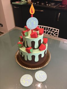 a birthday cake sitting on top of a table