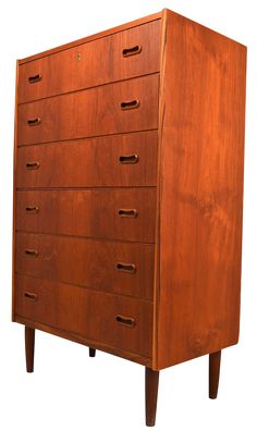 a wooden dresser with five drawers on one side and two legs, in the shape of a chest of drawers