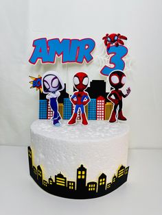 a spiderman themed birthday cake with the number 3 on it's top tier