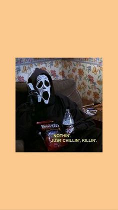 a person wearing a skeleton mask sitting on a couch with bottles in front of them