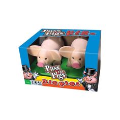 two plastic pigs are in a box