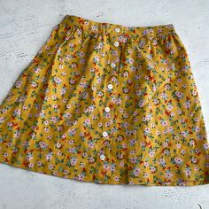 Brand New With Tags! Copper Key Kids Skirt. Size Small, 84% Rayon - 16% Linen. Lightweight And Perfect For Spring, Summer, And Fall! Such A Cute Floral Print. Full Front Buttons And Back Waist Elastic. Cute Cotton Bottoms With Buttons, Yellow School Skirt For Spring, Pink Buttoned Skirt For Spring, Pink Button Closure Skirt For Spring, Spring Pink Skirt With Button Closure, Pink Skirt With Button Closure For Spring, Spring Cotton Mini Skirt With Buttons, Casual Pink Skirt With Buttons, Pink Mini Skirt With Button Closure For Spring