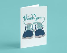 a thank card with a pair of blue shoes on the front and back of it