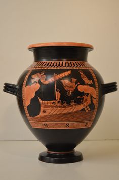 an old vase with some people on it