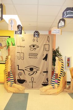 an egyptian themed classroom display with paper cutouts