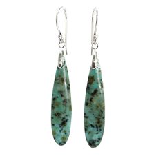 "African Turquoise Dangle Earrings. All natural, untreated turquoise in a lovely elongated teardrop shape. Dangle from sterling silver ear wires. Natural untreated African Turquoise 925 Sterling Silver About 2 3/8\" L x 3/8\" W Artisan made in Texas Arrives thoughtfully packaged in a signature kraft jewelry box" Cheap Large Beaded Turquoise Earrings, Turquoise Dangle Earrings, Turquoise Earrings Dangle, African Turquoise, Handmade African, Earrings Turquoise, Jewelry Studio, Amazon Handmade, Earrings Long