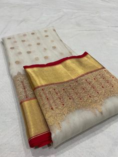 Join our Whatsapp Community Group for latest updates-https://chat.whatsapp.com/LidZNUslt5QAzMgXcJGMRb  Visit www.silktatva.com for extra discounts Pearl White Chanderi Handloom Pure Katan Silk Gold Zari Handwork Meenakari Borders Saree All over Gold zari buttas in the body of the saree Handwork Borders on both sides with Gold Zari and Meenakari in contrast color Heavy Pallu with Zari 100% Pure Chanderi Handloom Saree Saree includes unstitched blouse Exclusive Design Ready to ship We do Saree Fal Cheap Katan Silk Saree With Pallu Detail, Katan Silk Saree, Katan Silk, Handloom Saree, Latest Updates, Community Group, Cotton Silk, Silk Saree, Pearl White