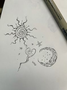 a pencil drawing of the sun and moon