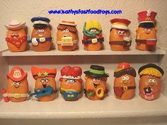 there are many potato head figurines on the shelf