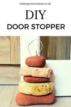 a stack of rocks sitting on top of each other with the words diy door stopper